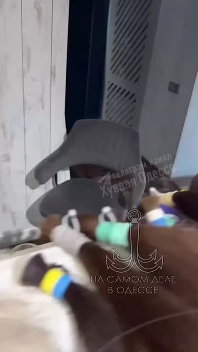   :.   
